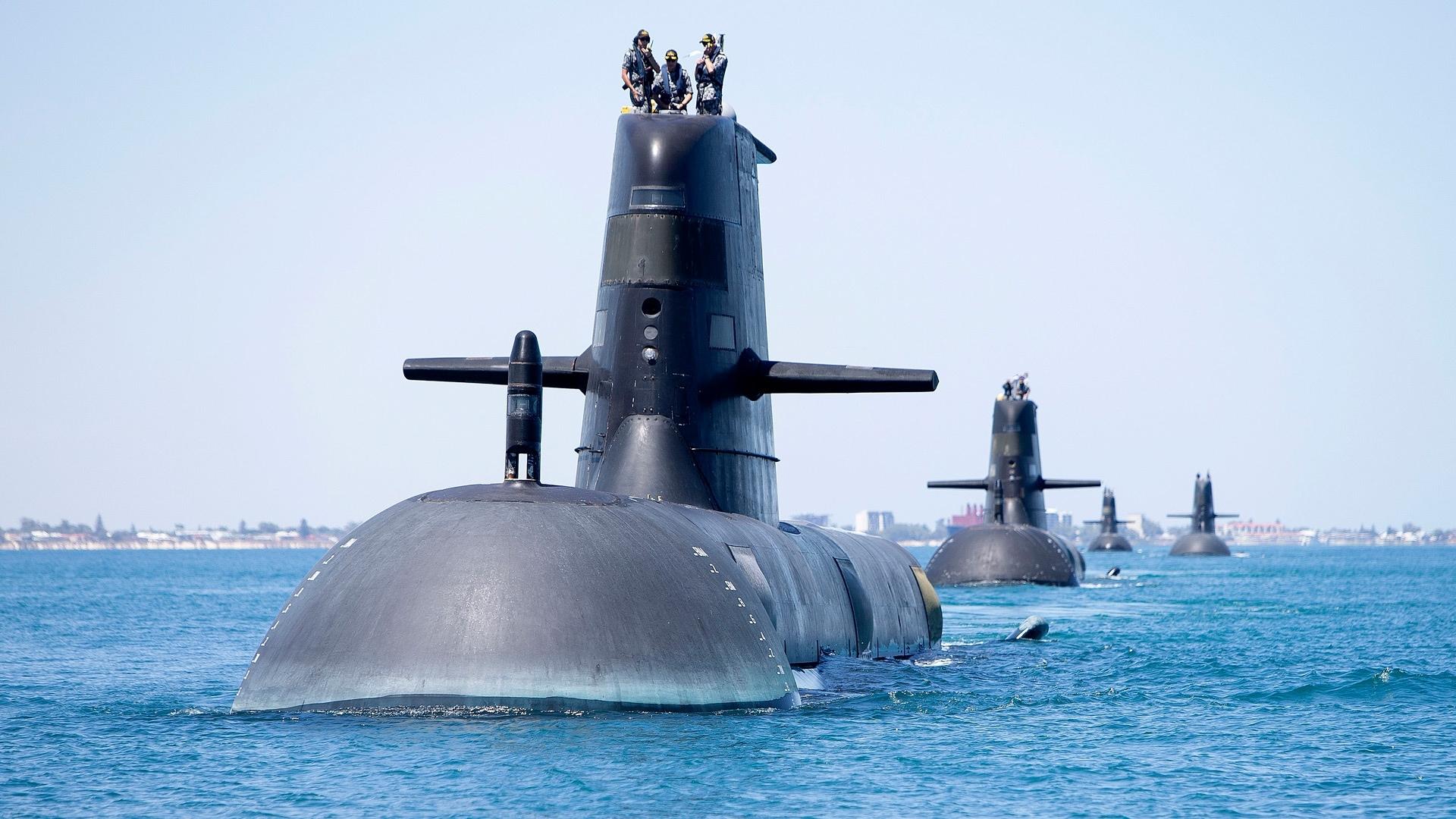 Collins Class Submarine in Sea With Crew On Top